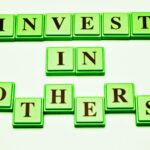 Investing in Others